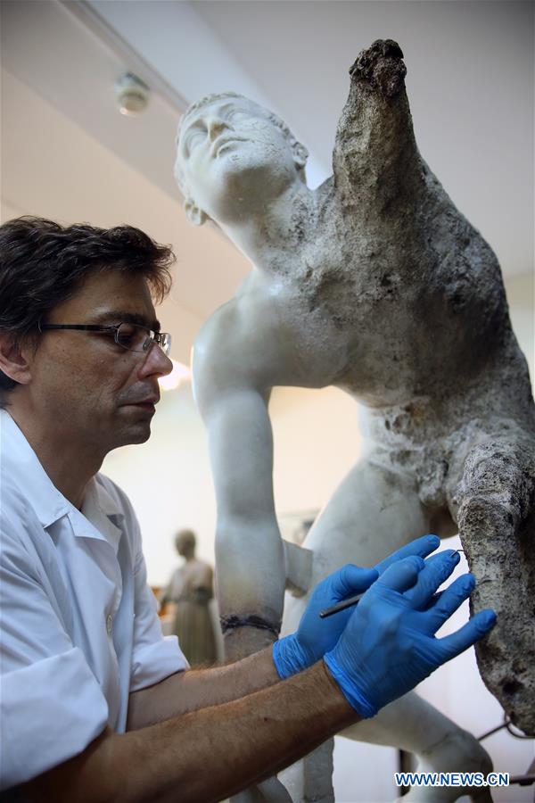 GREECE-ATHENS NATIONAL ARCHAEOLOGICAL MUSEUM-CONSERVATORS