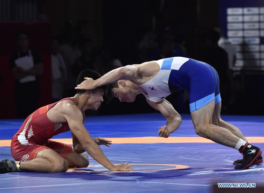 (SP)INDONESIA-JAKARTA-ASIAN GAMES-WRESTLING-MEN'S FREESTYLE 74KG 1/8 FINALS