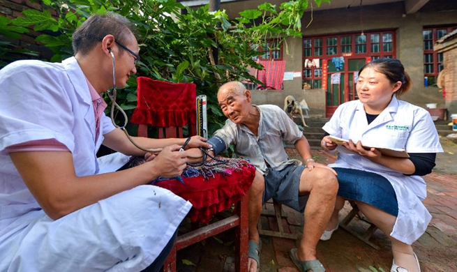 In pics: first Medical Workers' Day to be marked in China