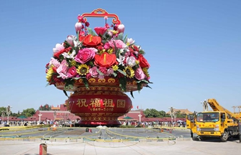 Decorating parterres set up in Beijing to greet National Day